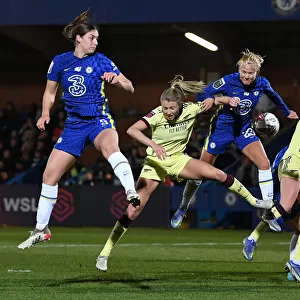 Leap of Determination: Williamson Fights for the Ball in Chelsea vs. Arsenal FA WSL Clash