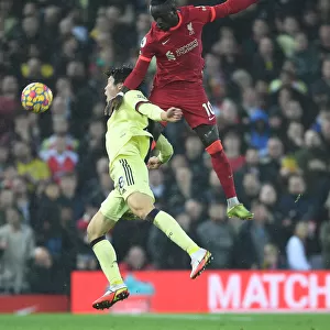 Liverpool vs. Arsenal: Intense Clash as Tomiyasu Fouls Mane
