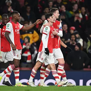 LONDON, ENGLAND - DECEMBER 21: (2ndR) Charlie Patino celebrates scoring the 5th Arsenal goal with (R)