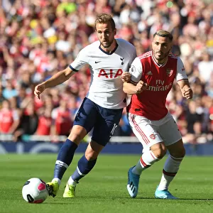 London Rivalry: Arsenal vs. Tottenham Clash in the Premier League - A Battle of Seasons Past: Kolasinac vs. Kane