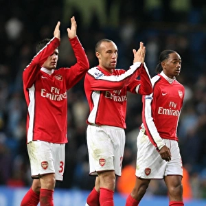 (L>R) Fran Merida, Mikael Silvestre, Sanchez Watt and Carlos Vela (Arsenal) clap the fans after the match. Manchester City 3: 0 Arsenal. Carlin Cup 5th Round. City of Manchester Stadium, 2 / 12 / 09. Credit : Arsenal Football Club