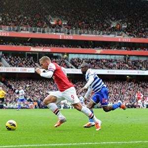 Lukas Podolski (Arsenal) Shaun Wright-Phillips (QPR). Arsenal 1: 0 Queens Park Rangers