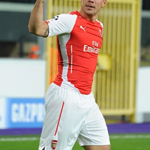 Lukas Podolski Scores the Second Goal: Arsenal's Victory over Anderlecht in the 2014-15 UEFA Champions League