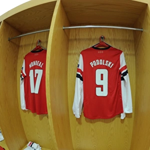 Lukas Podolski's Arsenal Jersey on Display: Arsenal FC vs. FC Bayern Munchen, UEFA Champions League Round of 16