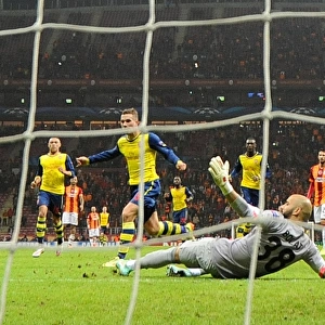 Lukas Podolski's Double Strike: Arsenal's Victory Over Galatasaray in UEFA Champions League (2014/15)