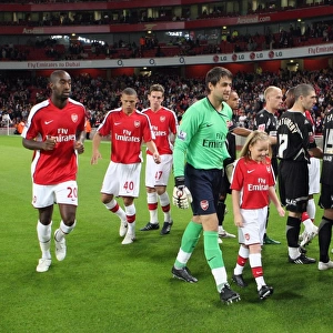 Lukasz Fabianski (Arsenal) with the mascot