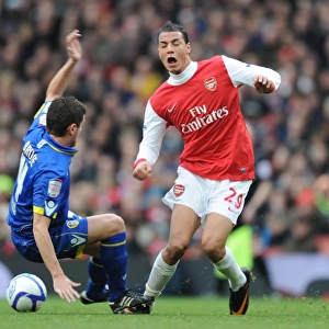 Marouane Chamakh (Arsenal) Alex Bruce (Leeds). Arsenal 1: 1 Leeds United