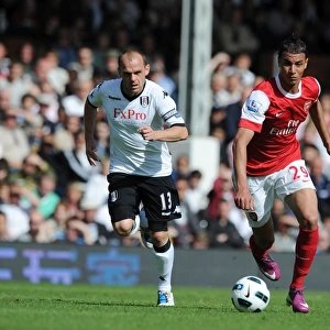 Marouane Chamakh (Arsenal) Danny Murphy (Fulham). Fulham 2: 2 Arsenal, Barclays Premier League