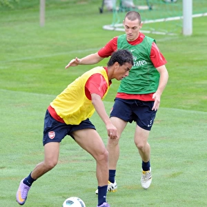 Marouane Chamakh and Thomas Vermaelen (Arsenal). Arsenal Training Camp