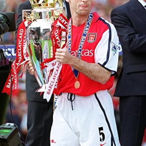 Martin Keown with the F. A. Barclaycard Premiership Trophy