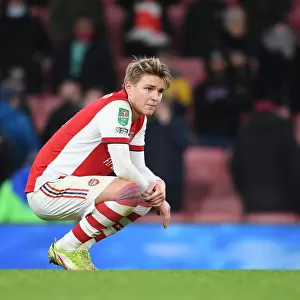 Martin Odegaard Disappointed: Arsenal's Reaction to Carabao Cup Semi-Final Defeat by Liverpool