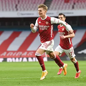 Martin Odegaard Scores Historic First Arsenal Goal Against Tottenham in Empty Emirates Stadium