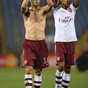 Mathieu Flamini and Gael Clichy (Arsenal) clap the fans at the end of the match