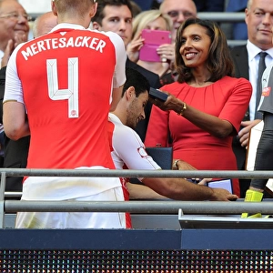 Per Mertesacker Receives Community Shield Medal from Janet Rocastle after Arsenal's Victory over Chelsea