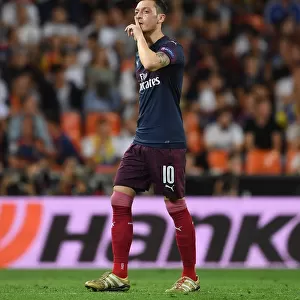 Mesut Ozil Gestures to Valencia Fans After Arsenal's Europa League Semi-Final Exit