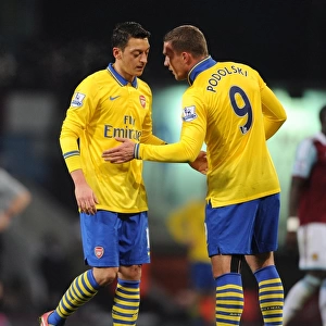 Mesut Ozil and Lukas Podolski (Arsenal). West Ham United 1: 3 Arsenal. Barclays Premier League