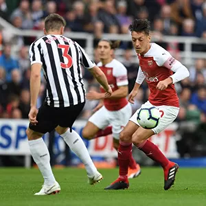 Mesut Ozil and Paul Dummett Clash in Intense Arsenal Victory over Newcastle United at St. James Park (1:2)