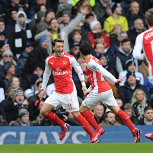 Mesut Ozil and Santi Cazorla Celebrate Goal: Tottenham vs. Arsenal, Premier League 2014-15