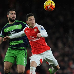 Mesut Ozil vs Jordi Amat: Intense Battle at the Emirates during Arsenal vs Swansea Clash (2015-16)