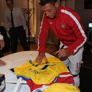 Mesut Ozil's Munich Debut: Arsenal's New Signing at Photo Shoot