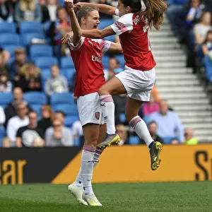 Miedema and van de Donk Celebrate Arsenal's Winning Goal vs. Brighton Women