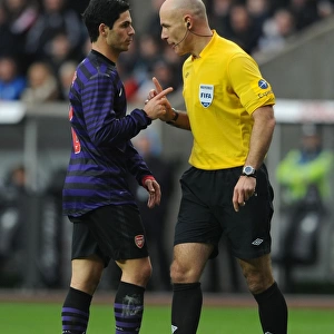 Mikel Arteta Conferring with Referee Howard Webb during Swansea vs Arsenal FA Cup Match