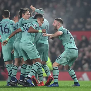 Mustafi, Aubameyang, and Bellerin Celebrate Arsenal's Goal Against Manchester United (2018-19)