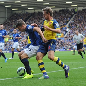 Nacho Monreal (Arsenal) Seamus Coleman (Everton). Everton 2: 2 Arsenal. Barclays Premier League