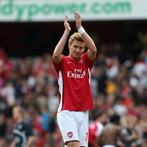 Nicklas Bendtner (Arsenal) claps the fans after the match