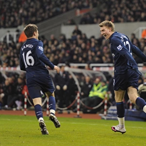 Nicklas Bendtner celebrates scoring the 1st Arsenal goal with Aaron Ramsey
