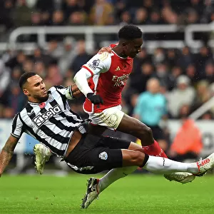 Nketiah vs Lascelles: Intense Battle in Newcastle United vs Arsenal FC, Premier League 2023-24