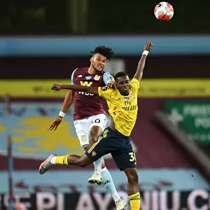 Nketiah vs. Mings: A Premier League Showdown at Villa Park