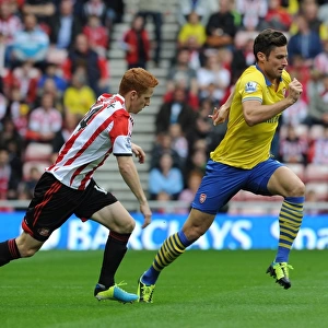 Olivier Giroud (Arsenal) Jack Colback (Sunderland). Sunderland 1: 3 Arsenal. Barclays Premier League