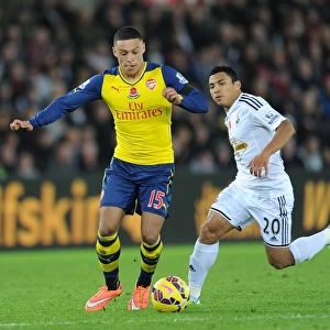 Oxlade-Chamberlain Outwits Montero: Arsenal's Star Outsmarts Swansea in Premier League Clash