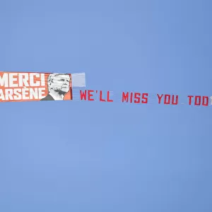Plane Flies Over Huddersfield Stadium with Arsene Wenger Banner during Arsenal Match