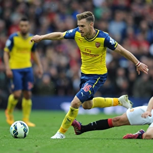 Ramsey Surges Past Herrera: A Premier League Showdown (2014-15) - Manchester United vs. Arsenal
