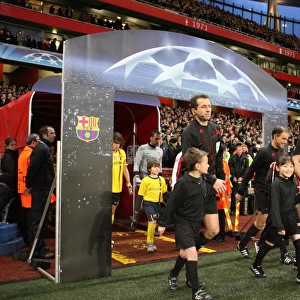 The Referees walk out with the mascots. Arsenal 2: 2 Barcelona. UEFA Champions League