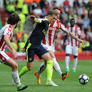 Rob Holding (Arsenal) Marko Arnautovic (Stoke). Stoke City 1: 4 Arsenal. Premier League