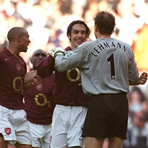 Robert Pires celebrates scoring the Arsenal goal with Gael Clichy and Jens Lehmann