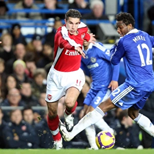 Robin van Persie (Arsenal) Jon Mikel Obi (Chelsea)