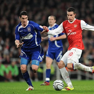 Robin van Persie (Arsenal) Mark Kennedy (Ipswich). Arsenal 3: 0 Ipswich Town