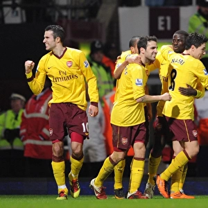 Robin van Persie celebrates scoring his 2nd goal Arsenals 3rd with his team mates