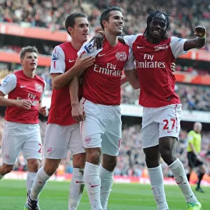 Robin van Persie celebrates scoring his 2nd goal Arsenals 3rd with Aaron Ramsey and Gervinho
