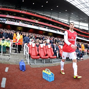 Robin van Persie's Hat-Trick: Arsenal's Dominant 3-0 Win Over Wigan Athletic in the Premier League