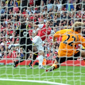 Robin van Persie's Stunner: Arsenal Crushes Bolton 3-0 in Premier League