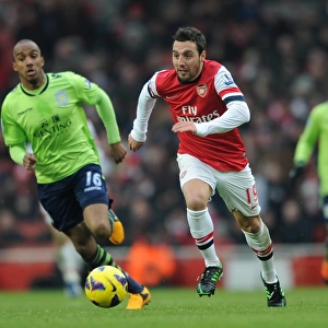 Santi Cazorla (Arsenal) Fabian Delph (Villa). Arsenal 2: 1 Aston Villa. Barclays Premier League