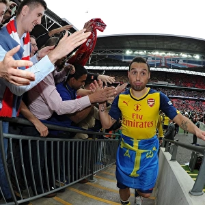 Santi Cazorla's Triumphant FA Cup Celebration: Arsenal's Victory over Aston Villa