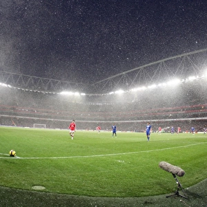 Snow falls during the match at Emirates. Arsenal 2: 2 Everton. Barclays Premier League
