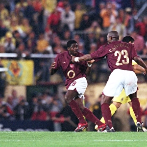 Sol Campbell and and Kolo Toure (Arsenal) celebrate at the final whistle