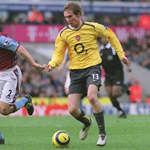 Stalemate at Villa Park: Alex Hleb vs Mark Delaney in the 0-0 Arsenal-Aston Villa FA Premiership Clash, December 2005